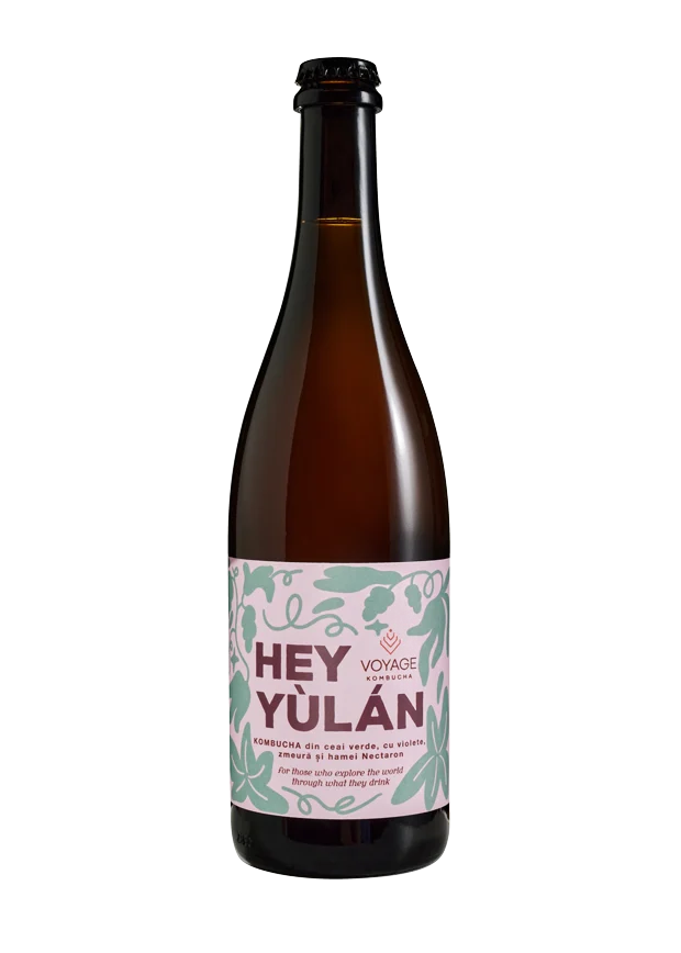 Sticlă de kombucha Hey Yùlán cu etichetă roz și verde